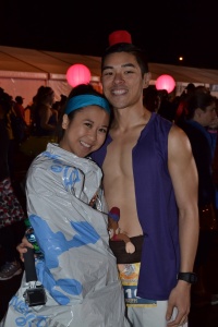 Before the race! Wrapped up in my throwaway jacket and a runDisney mylar blanket. Joseph is just chillin'. 